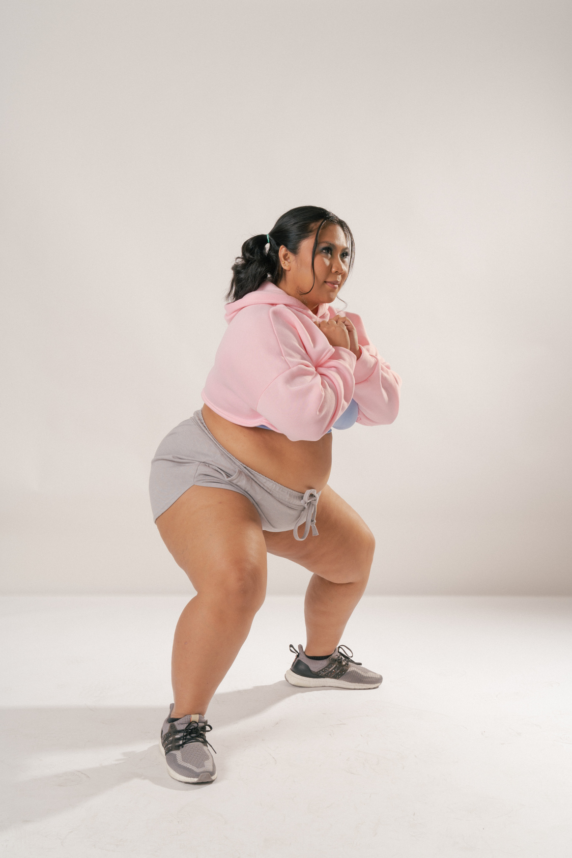 Woman in Activewear on White Background